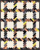 a quilt made with squares and dots