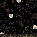 a black background with stars and moon faces