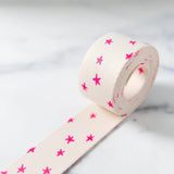 Starry Webbing Natural in Pink 1 1/2" wide sold by the yard.